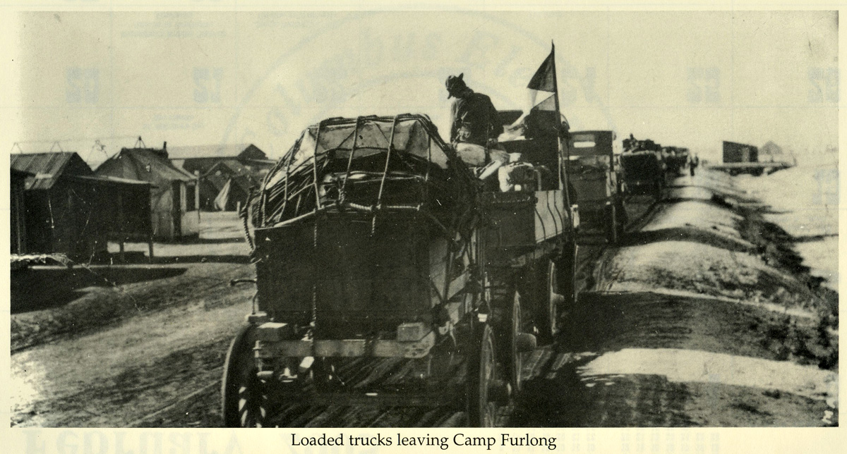 Loaded Trucks Leaving Camp Furlong