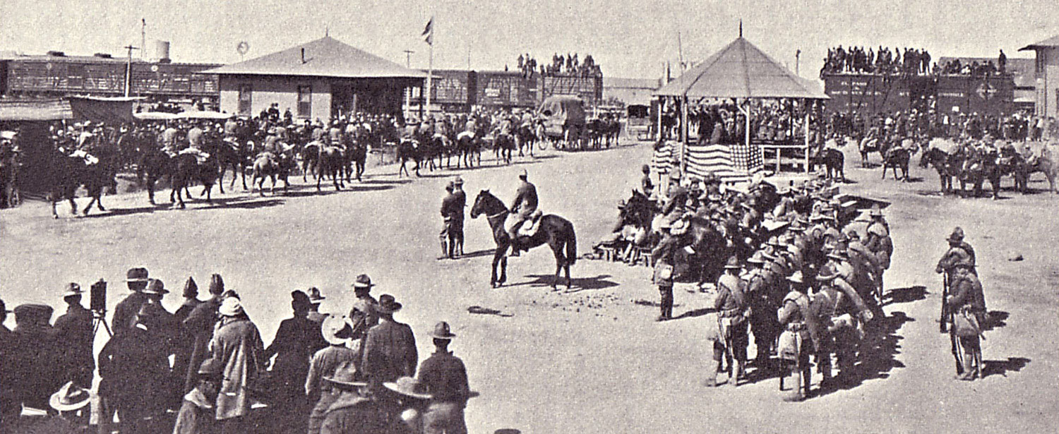 United States Troops Re-crossing Mexican Border - General Pershing reviewing his troops as they withdrew from Mexico, into which they had been sent with orders to capture Villa, the Mexican bandit, whose guerrillas had made a murderous attack on Columbus, New Mexico. The expedition was a fruitless one.